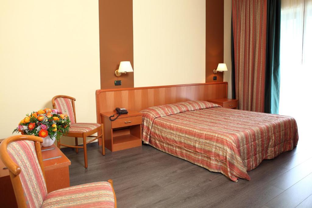 Hotel Romanisio Фоссано Номер фото